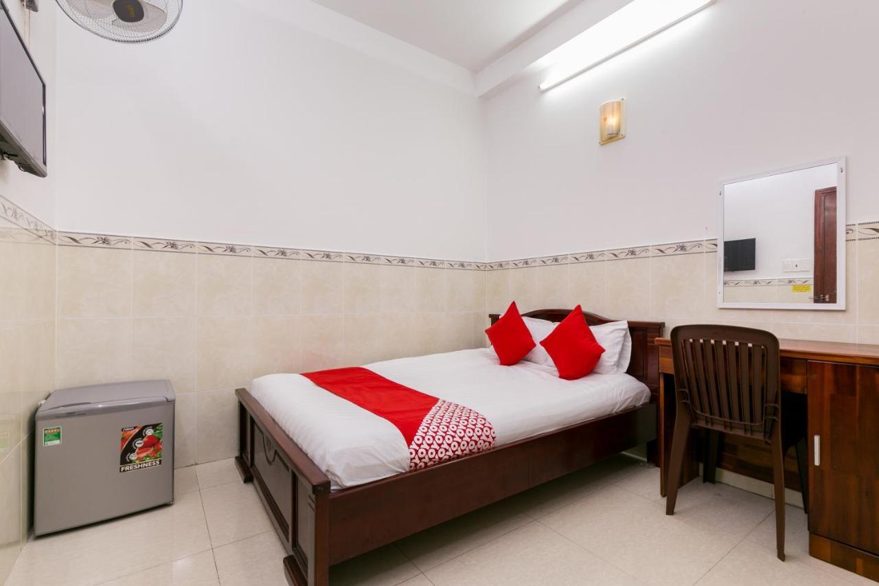 Oyo 372 Vy Ha Hotel Хошимин Экстерьер фото