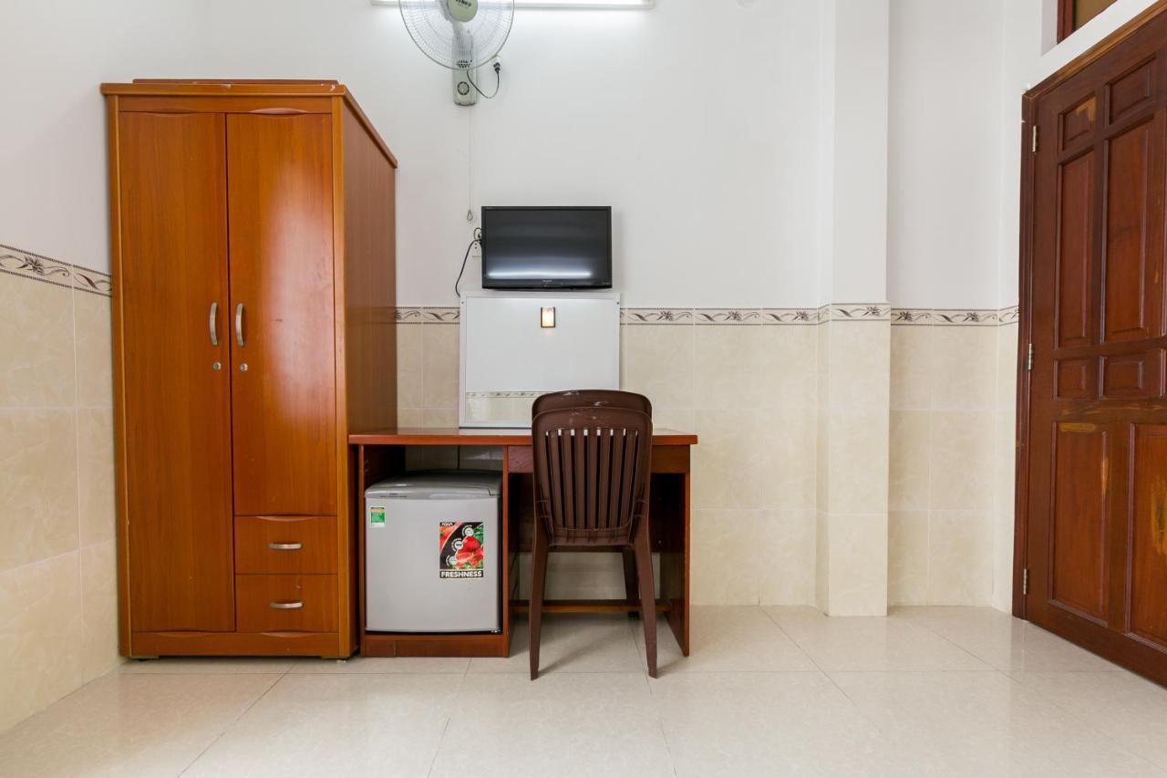 Oyo 372 Vy Ha Hotel Хошимин Экстерьер фото