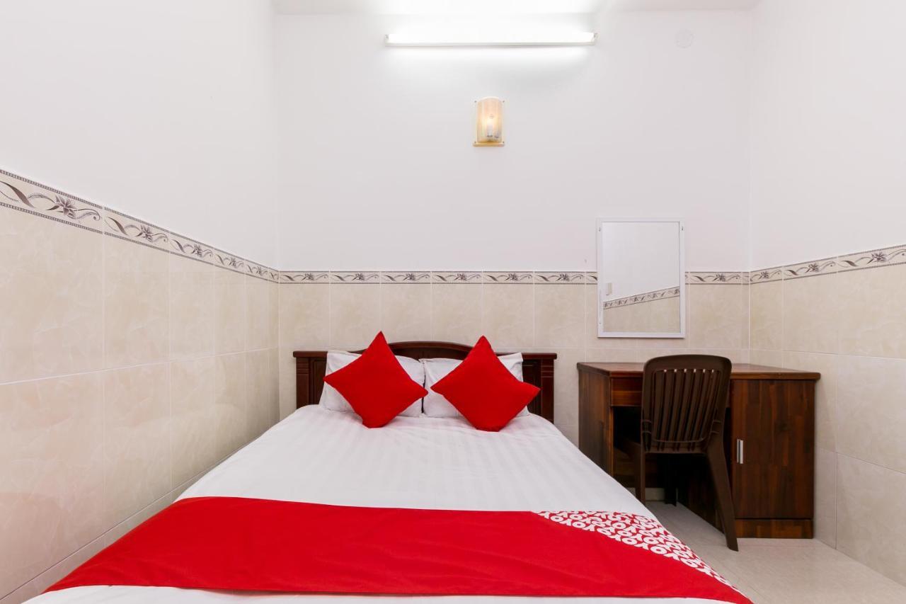 Oyo 372 Vy Ha Hotel Хошимин Экстерьер фото