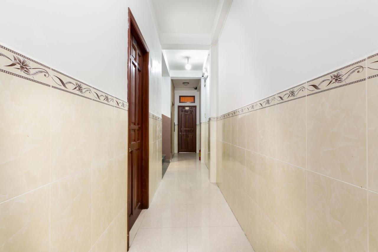 Oyo 372 Vy Ha Hotel Хошимин Экстерьер фото