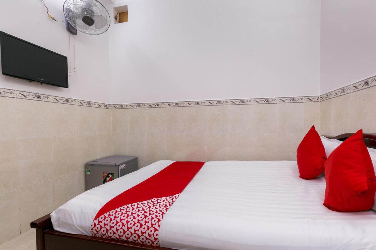 Oyo 372 Vy Ha Hotel Хошимин Экстерьер фото