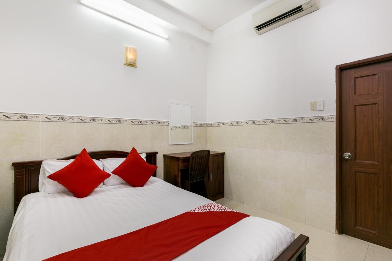 Oyo 372 Vy Ha Hotel Хошимин Экстерьер фото