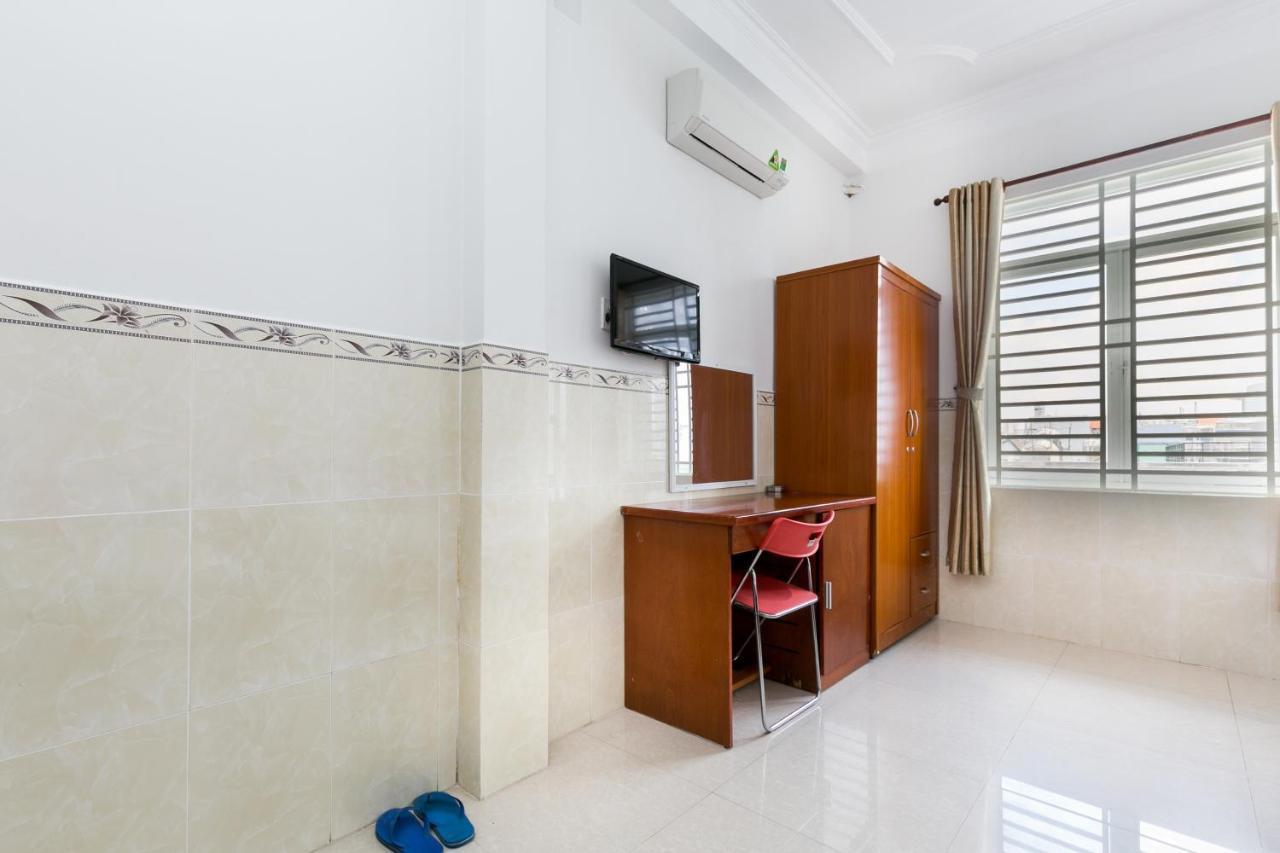 Oyo 372 Vy Ha Hotel Хошимин Экстерьер фото